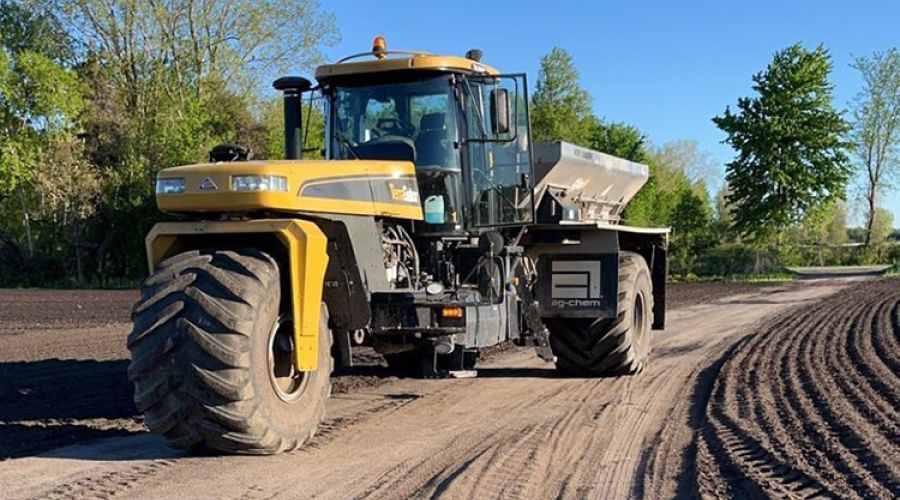 Yellow spreader truck